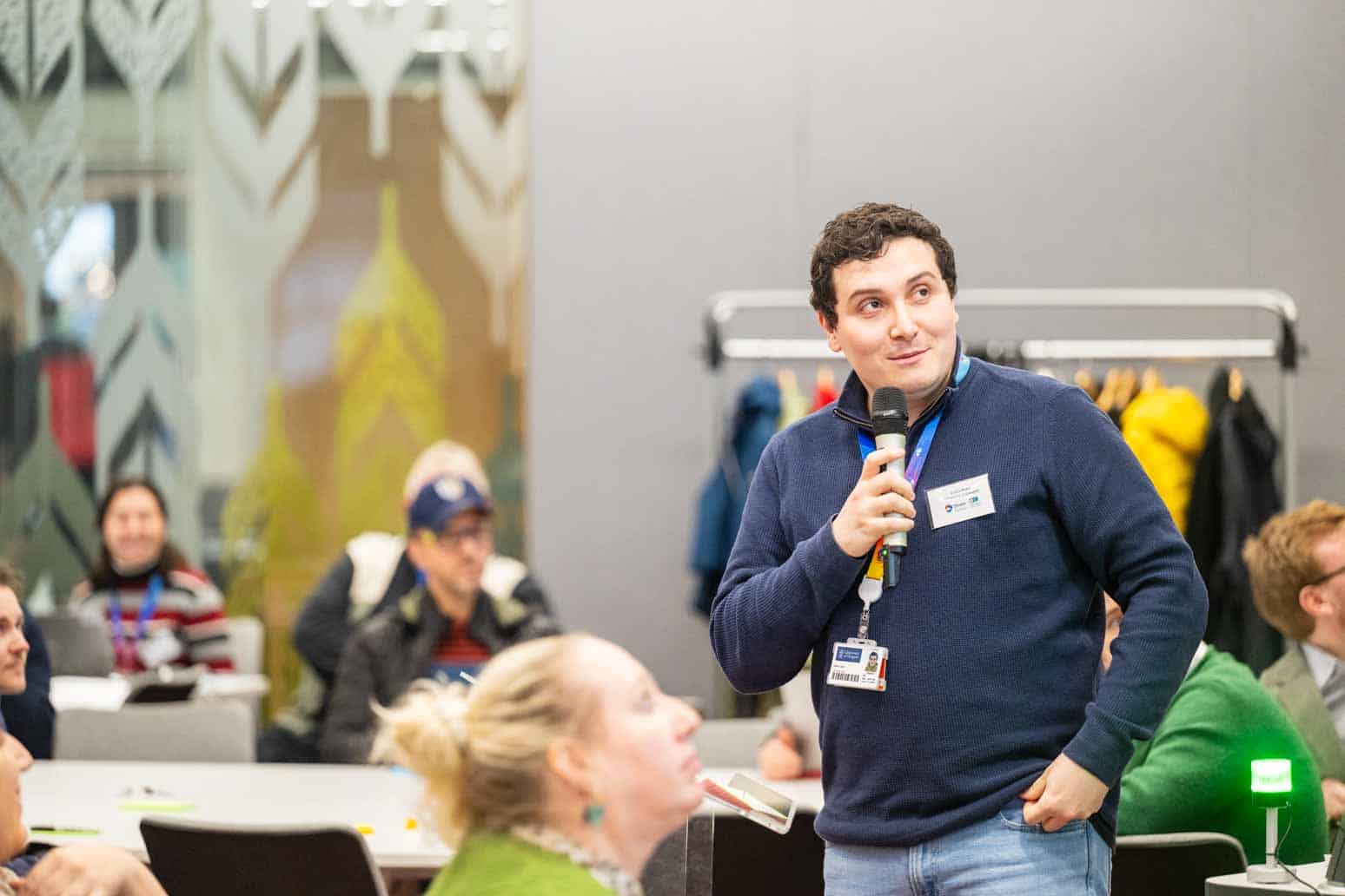 Lukas Moers (DiveIn PGR - Cohort 1) presenting her teams challenge discussions at the Annual Industry Showcase 2025